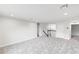 Spacious loft area with neutral carpet, white walls and staircase at 2659 Fiddle Leaf Loop, Apopka, FL 32712