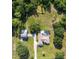 Aerial view of the home, pool, detached garage, and large property at 2659 Hibbard Trl, Chuluota, FL 32766