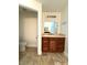 Bathroom with a single sink vanity and separate toilet room at 2659 Hibbard Trl, Chuluota, FL 32766