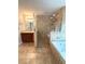 Bathroom featuring soaking tub, stand up shower, and a vanity sink at 2659 Hibbard Trl, Chuluota, FL 32766