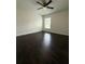 Bedroom with dark wood floors and a ceiling fan at 2659 Hibbard Trl, Chuluota, FL 32766