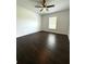 Bedroom with wood floors, neutral paint and a window letting in natural light at 2659 Hibbard Trl, Chuluota, FL 32766