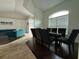 Open-concept dining area connected to the living room at 2659 Hibbard Trl, Chuluota, FL 32766