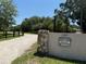 A stone and stucco welcome sign marks the entrance to North Lake Pickett Easement community at 2659 Hibbard Trl, Chuluota, FL 32766