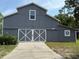 Charming two-story outbuilding offers versatile space, adding value and character to the property at 2659 Hibbard Trl, Chuluota, FL 32766