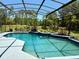 Enjoy the cool water of this gorgeous pool with a waterfall feature and well-manicured landscaping at 2659 Hibbard Trl, Chuluota, FL 32766