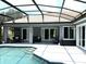 Enjoy this gorgeous screened-in pool, perfect for relaxing and entertaining in your new home at 2659 Hibbard Trl, Chuluota, FL 32766