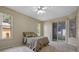 Bedroom with carpeting, natural light and a sliding glass door at 2710 Autumn Ln, Eustis, FL 32726