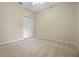 Bedroom featuring carpeted floors and a window at 2710 Autumn Ln, Eustis, FL 32726