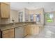 Well-appointed kitchen featuring granite countertops and stainless steel appliances at 2710 Autumn Ln, Eustis, FL 32726