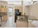 Eat-in kitchen boasting granite countertops and stainless steel appliances at 2710 Autumn Ln, Eustis, FL 32726