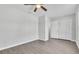 Clean bedroom with wood-look flooring and a ceiling fan at 283 Woodgreen Ln, Winter Springs, FL 32708