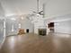 Bright living room featuring vaulted ceilings, fireplace, and an open floor plan at 306 Foxboro Ct, Lake Mary, FL 32746