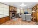 Relaxing living room with a traditional brick fireplace and cozy seating at 3118 Walnut St, Winter Haven, FL 33881