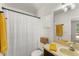 Bright bathroom featuring a shower and tub combination, neutral color scheme, and modern lighting at 3270 Courtland Blvd, Deltona, FL 32738