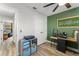 Well-lit office space with modern decor, ample storage, and easy access to other rooms at 3270 Courtland Blvd, Deltona, FL 32738