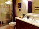 Bathroom featuring tiled flooring, wood vanity, and glass enclosed shower with attractive shower tile at 3312 Bridgeford Dr, Orlando, FL 32812