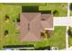Bird's eye view of the property highlighting the roof, landscaping, driveway, and surrounding yard at 356 Quarry Rock Cir, Kissimmee, FL 34758