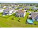 Aerial view of backyard featuring a pool in a residential community at 356 Quarry Rock Cir, Kissimmee, FL 34758