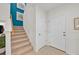 Inviting entryway with a staircase and tile flooring at 356 Quarry Rock Cir, Kissimmee, FL 34758