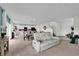 Spacious living area with the kitchen in the background and comfortable seating arrangements at 356 Quarry Rock Cir, Kissimmee, FL 34758