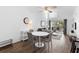 Inviting dining area with stylish furnishings, natural light, and open access to the living space at 3900 Southpointe Dr # 127, Orlando, FL 32822