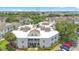 An aerial view of the condo building shows its well-maintained facade and landscaping at 3900 Southpointe Dr # 127, Orlando, FL 32822