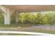 A view of protected green space, complete with wooden rail fencing at 3900 Southpointe Dr # 127, Orlando, FL 32822