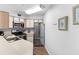 Well-equipped kitchen featuring stainless steel appliances at 3900 Southpointe Dr # 127, Orlando, FL 32822