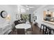 Bright living area featuring high ceilings, modern furnishings, and a sliding glass door to the outside at 3900 Southpointe Dr # 127, Orlando, FL 32822