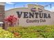 Ventura Country Club community sign surrounded by lush landscaping and tropical foliage at 3900 Southpointe Dr # 127, Orlando, FL 32822