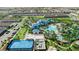 Aerial view showcases resort-style pool, basketball court, beach volleyball, and community amenities at 4314 Lana Ave, Davenport, FL 33897