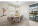 Charming dining room with playful cartoon-themed decor and modern lighting at 4314 Lana Ave, Davenport, FL 33897