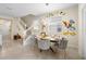 Bright dining room with playful wall decor and stylish gray chairs surrounding the table at 4314 Lana Ave, Davenport, FL 33897