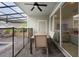 Enjoy the outdoor living with covered lanai including ceiling fan and a view of the backyard at 4314 Lana Ave, Davenport, FL 33897