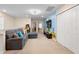 Cozy upstairs loft area with a comfortable sectional sofa and fun cartoon wall decor at 4314 Lana Ave, Davenport, FL 33897