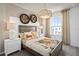 Bedroom with decorative hanging baskets over the bed with a fun tiger themed bedspread and pillows at 4564 Maple Waltz Aly, Clermont, FL 34714