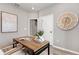 Another view of the office space with a desk and a large window at 4564 Maple Waltz Aly, Clermont, FL 34714