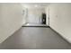 Unfinished basement with block walls, gray painted concrete floor and new hot water heater at 472 Little Aspen Ct, Ocoee, FL 34761