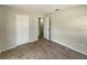 Neutral bedroom featuring wood-look flooring and closet at 472 Little Aspen Ct, Ocoee, FL 34761