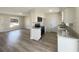 Modern kitchen with stainless steel appliances, granite countertops, and ample cabinet space at 472 Little Aspen Ct, Ocoee, FL 34761