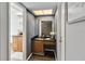 Stylish powder room featuring modern fixtures and an elegant vanity at 4930 Gifford Blvd, Orlando, FL 32821