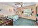 Bright bedroom filled with natural light, complete with a ceiling fan at 4930 Gifford Blvd, Orlando, FL 32821