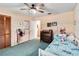 Cozy bedroom features wood-look floors, and a spacious closet at 4930 Gifford Blvd, Orlando, FL 32821