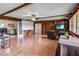 Open bonus room with tile floor, lots of light, TV and built-in storage at 4930 Gifford Blvd, Orlando, FL 32821