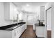 Bright kitchen with new appliances, granite countertops, and wood flooring at 611 Lakespur Ln, Altamonte Springs, FL 32714