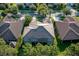 This aerial view showcases a large two-story home nestled among mature trees at 7536 Green Mountain Way, Winter Garden, FL 34787