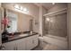 Well-lit bathroom featuring modern fixtures and a glass-enclosed shower at 7536 Green Mountain Way, Winter Garden, FL 34787