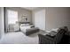 Bedroom with a plush chair, comfortable bed, and a window offering lots of natural light at 7536 Green Mountain Way, Winter Garden, FL 34787