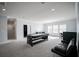 Spacious game room with a pool table, casual seating, and ample natural light at 7536 Green Mountain Way, Winter Garden, FL 34787